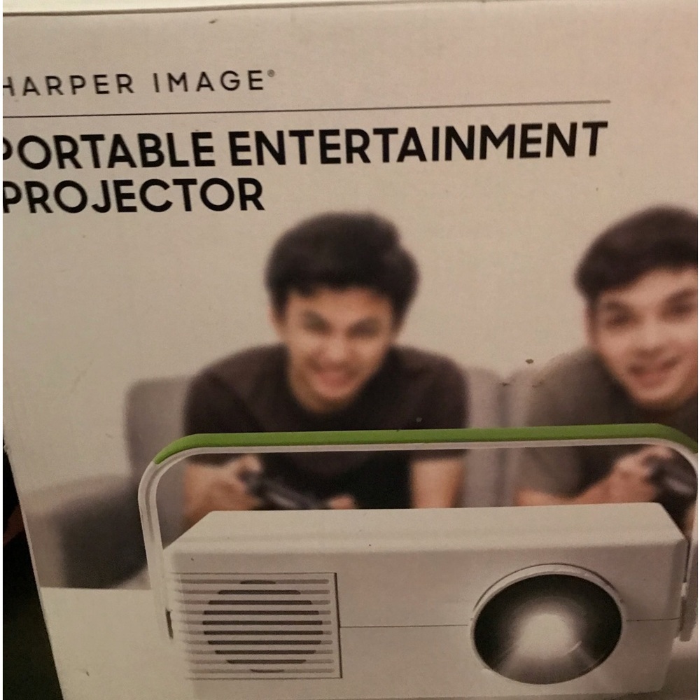 New open box, Shaper Image portable entertainment projector